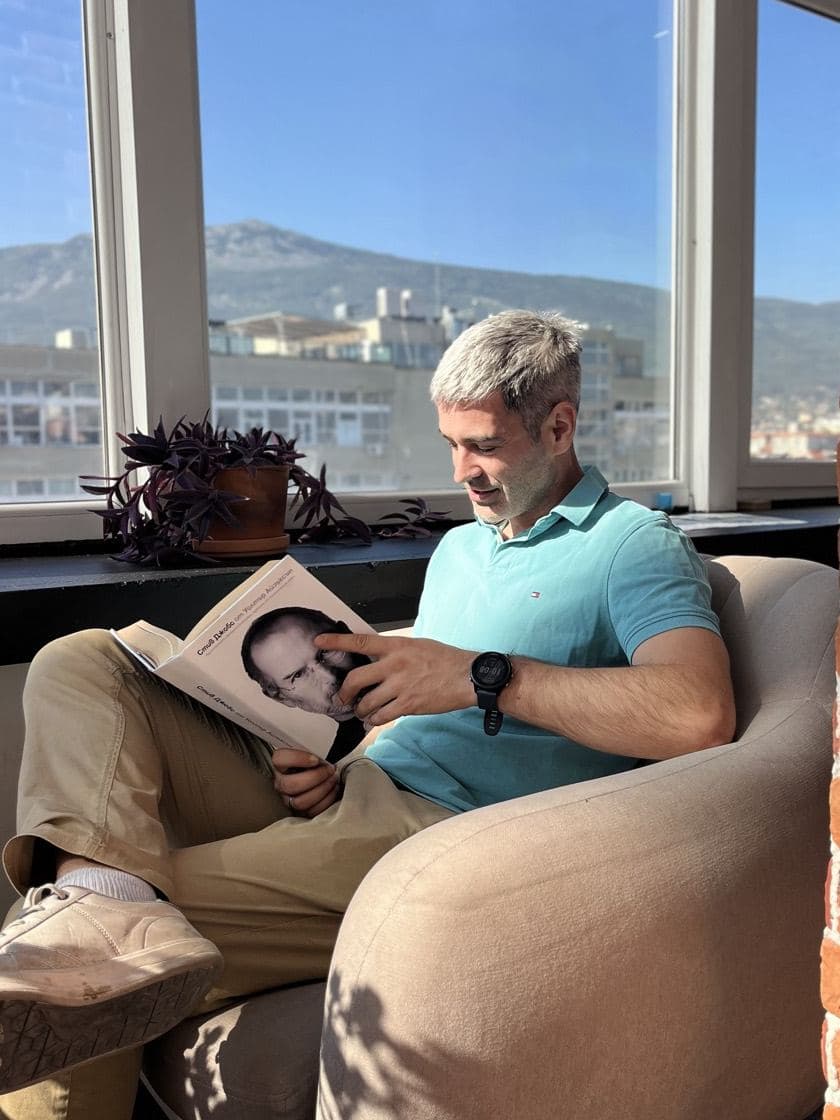 Alex Lio, indirect procurement operator, at work in his coworking space